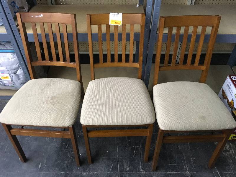 THREE FOLDING CHAIRS WITH PADDED SEATS