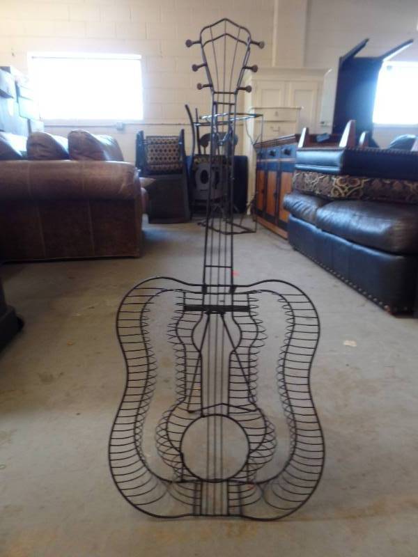 lot 810 image: GUITAR SHAPED CD STAND