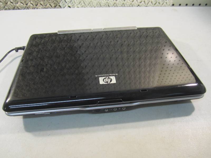 lot 59 image: HP Pavilion tx1000 Laptop Computer ...