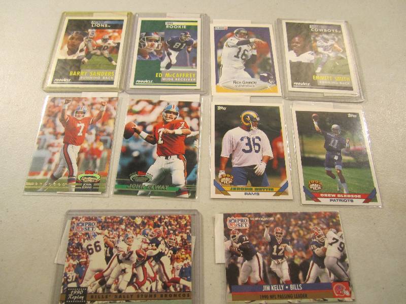 lot 186 image: Lot of 10 Football Cards in Sleeves...