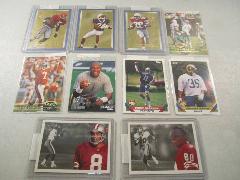 lot 194 image: Lot of 10 Football Cards in Sleeves...
