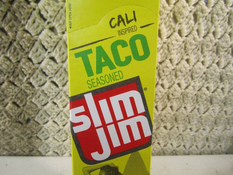 lot 289 image: Box of 24 Slim Jim Sticks Taco Seas...