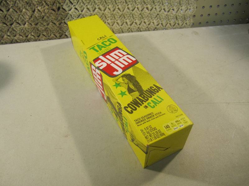 lot 290 image: Box of 24 Slim Jim Sticks Taco Seas...
