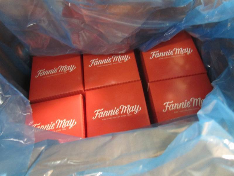 lot 292 image: Case of 6 Boxes Fannie May Milk Cho...