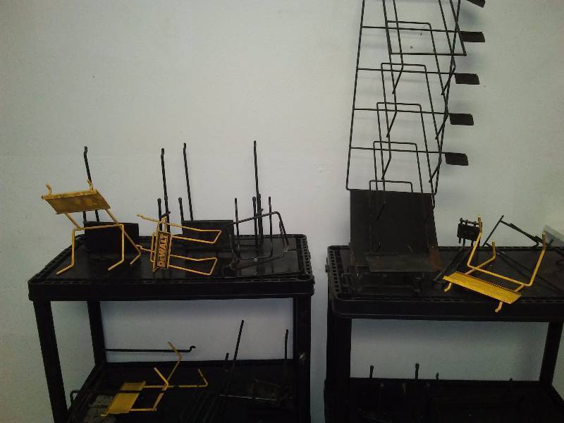 lot 13 image: Commercial Grade Peg Board Holders (15)