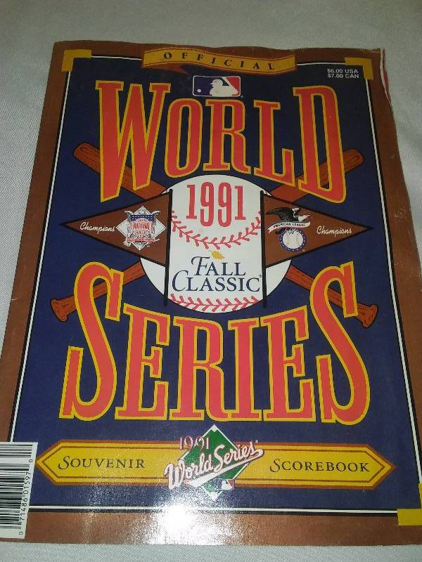 lot 128 image: 1991 World Series Official Souvenir Scorebook, Complete