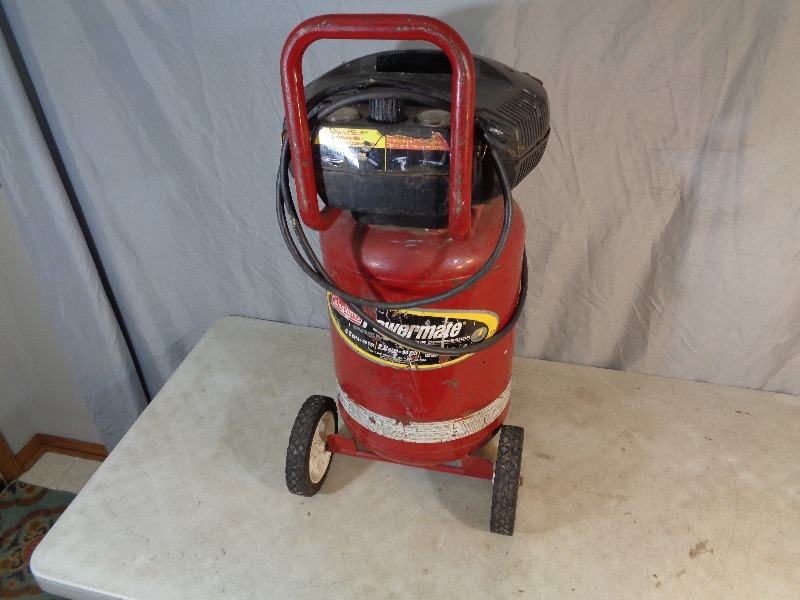 lot 6 image: Coleman 8 Gallon Air Compressor