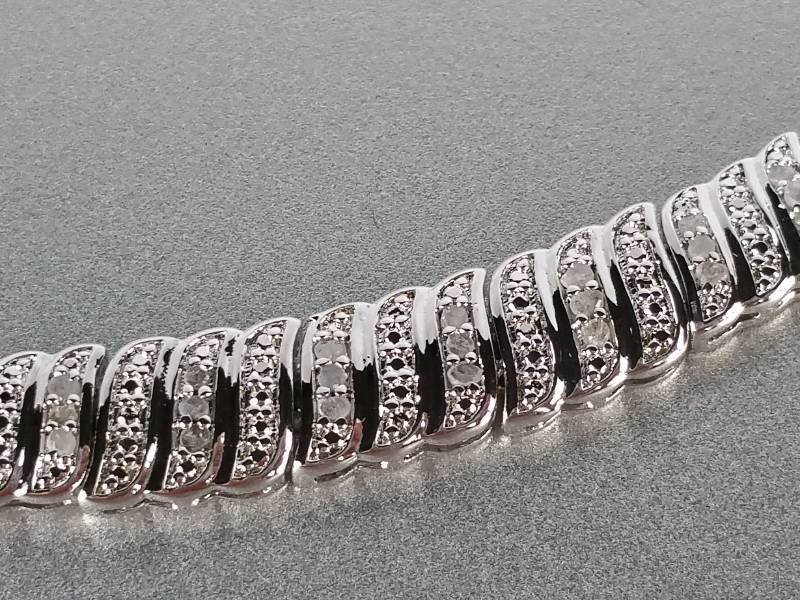 lot 6 image: Diamond Eternity Necklace