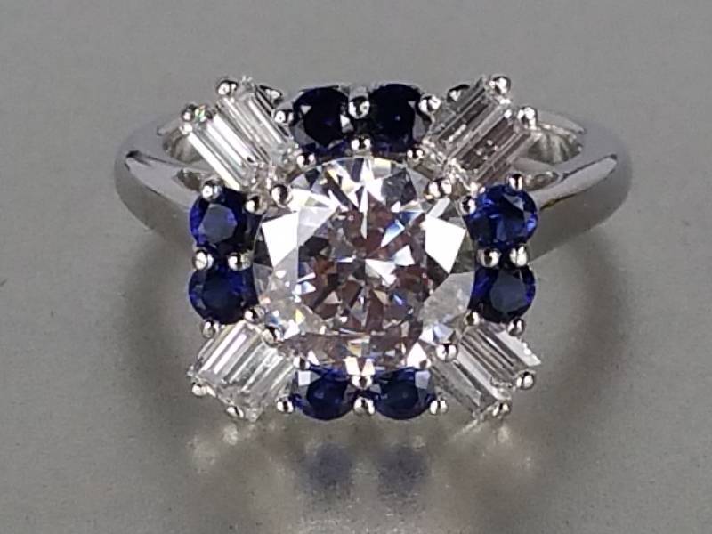 lot 58 image: Blue and White Sapphire Ring