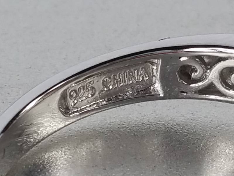 lot 94 image: White Sapphire Ring