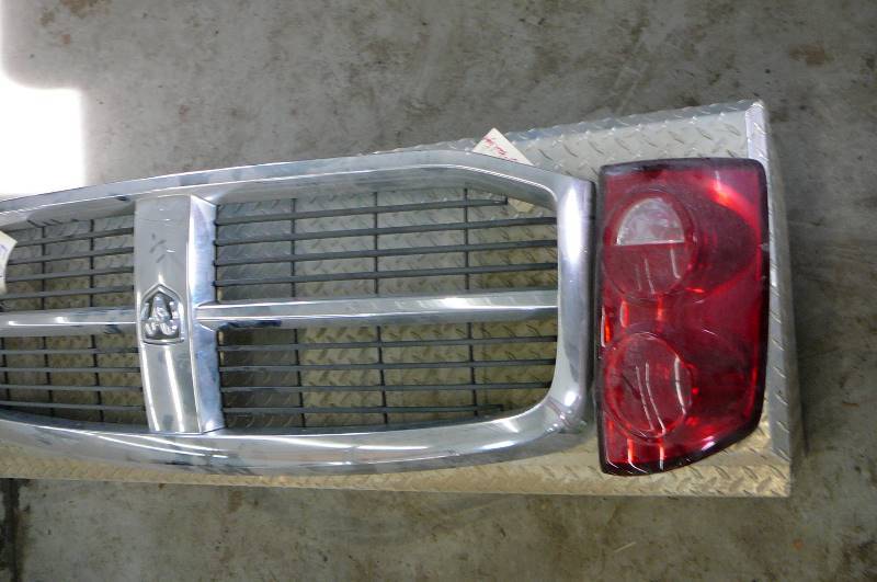 lot 59 image: Dodge pickup Grill & Tail light