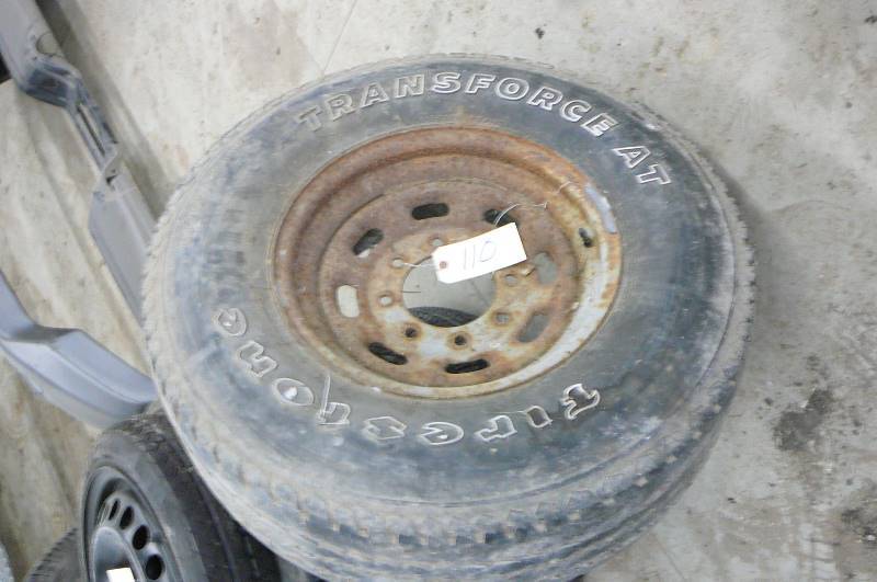lot 110 image: Firestone 26575r16