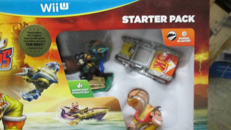 lot 117 image: Lot of 4 Wii Skylanders SuperCharge...