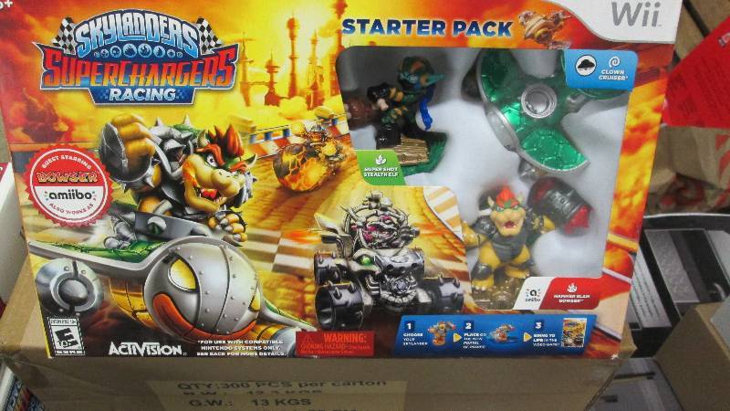 lot 119 image: Lot of 4 Wii Skylanders SuperCharge...