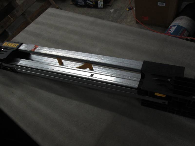 lot 225 image: Dewalt Folding Sawhorse...