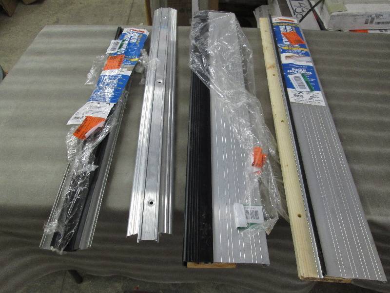 lot 379 image: Lot of 4 Door Thresholds...