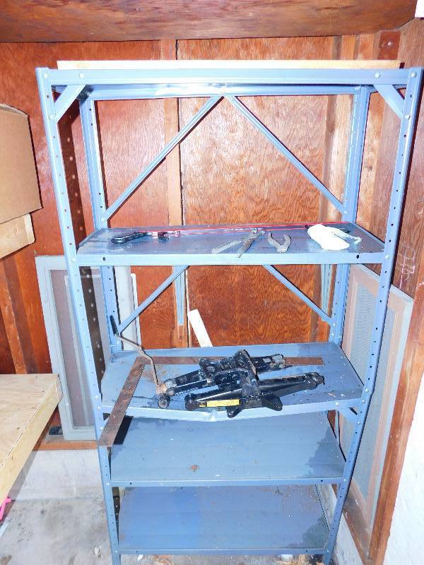 1 Metal Shelve With Contents