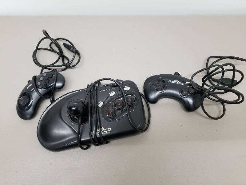 lot 33 image: SEGA GENESIS CONTROLLERS LOT