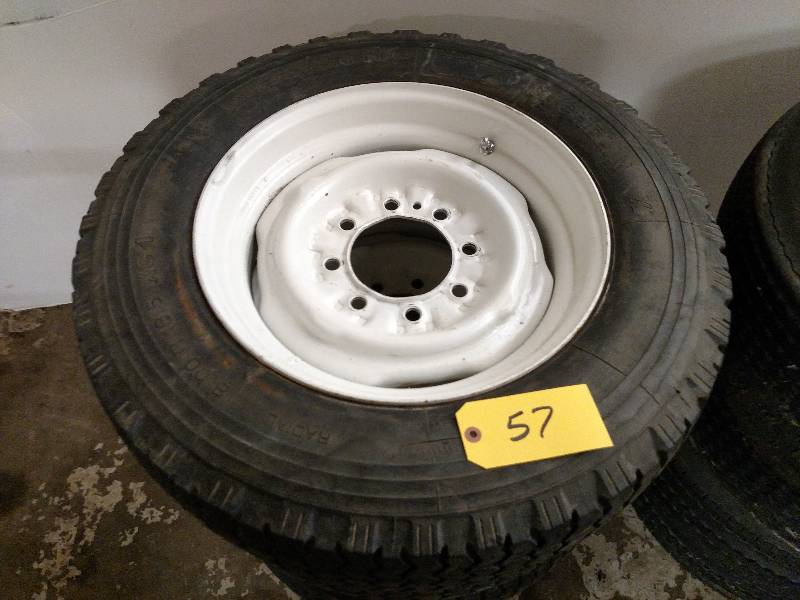 lot 57 image: (4) 34 Ton Pickup Wheels, 16.5x6 w...