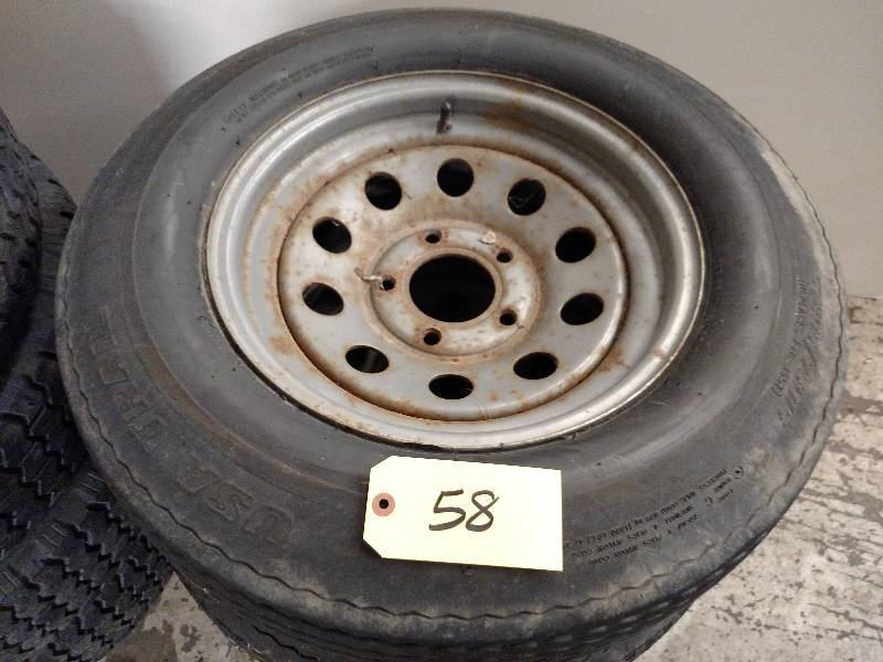 lot 58 image: (4) 15x6 Trailer Wheels with Carlis...