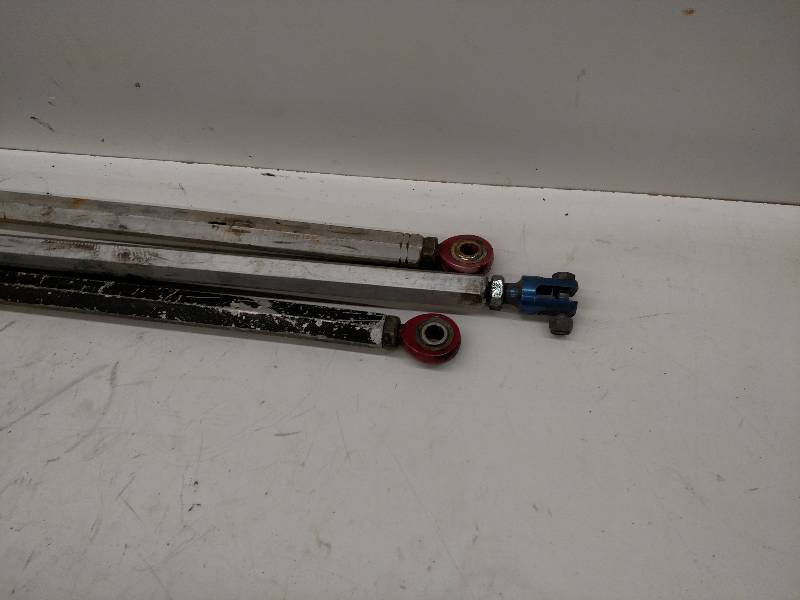 lot 299 image: (3) Aluminum Trailing Arms, 58 Ends