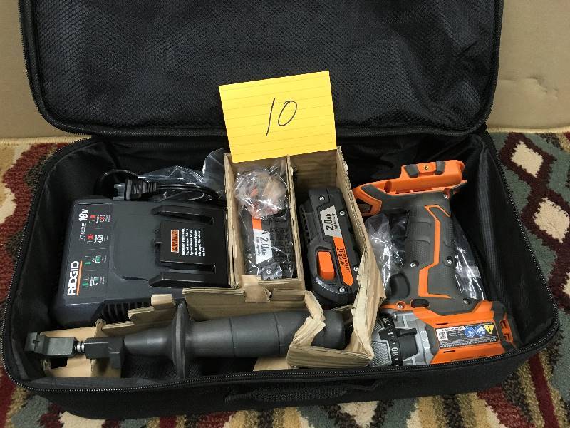 lot 10 image: Ridgid 18 Volt Brushless Compact Hammer DrillDriver Kit not used