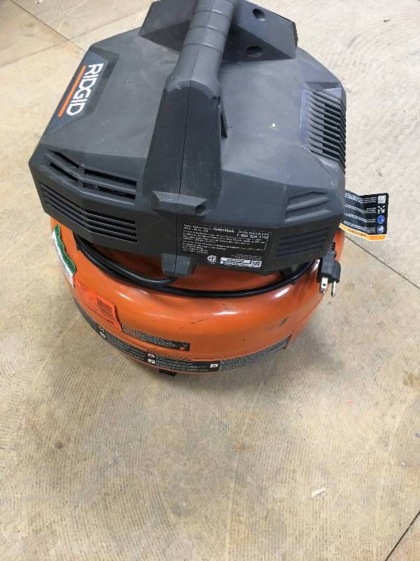 lot 28 image: Ridgid Pancake Air Compressor in working conditions