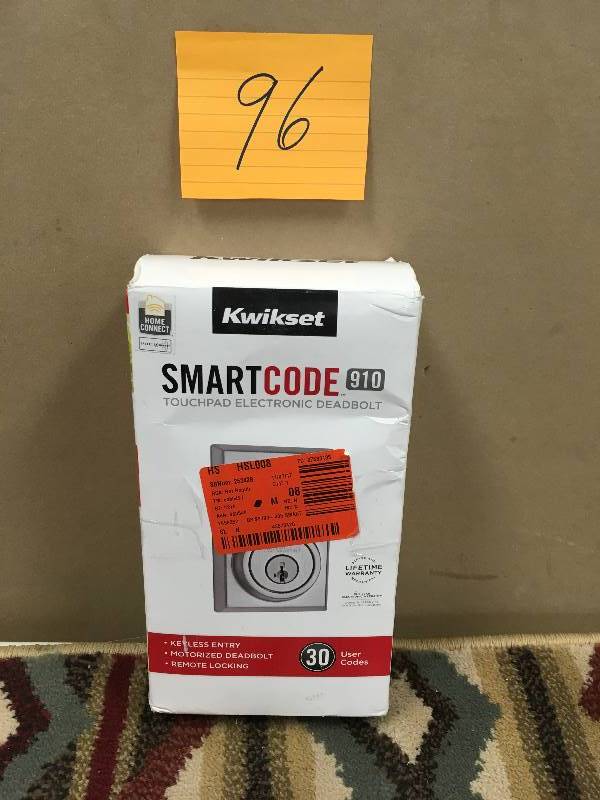 lot 96 image: Kwikset Satin Nickel Traditional Deadbold not used