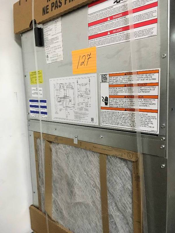 lot 127 image: Goodman 3 Ton Air Conditioner Wall Mounted Air Handler with 5 kW Heat not used