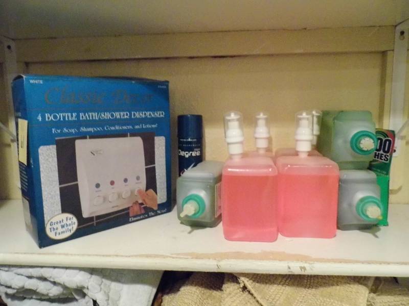 lot 61 image: Shower Dispenser - Soaps