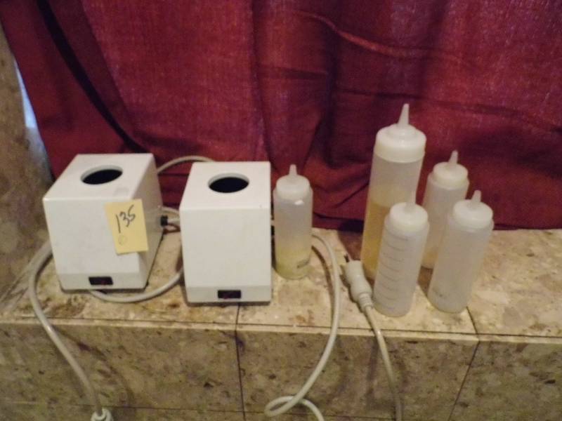 lot 135 image: Massage Oil Warmer w Bottles