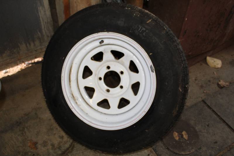 lot 225 image: ST20575R15 Tire w 5-Lug 15in. Wheel
