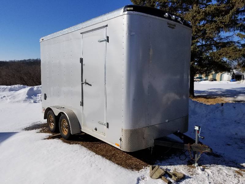 lot 8 image: 2010 Continental Cargo, Tailwind Model Dual Axle Enclosed Trailer w Drop Rear Door
