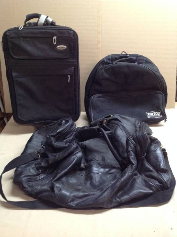 Luggages - Leather Duffel Bag, Rolling Suit Case, And a CB700