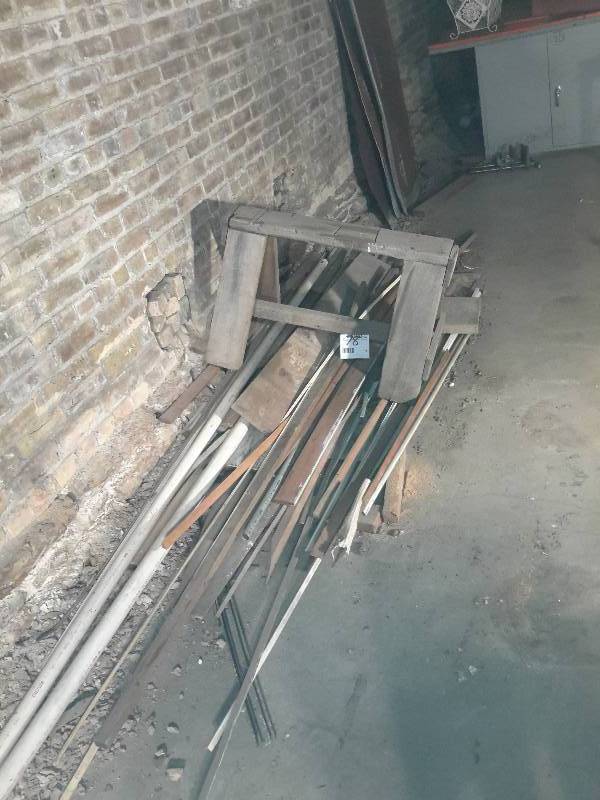lot 78 image: Misc. Pipe, wood and saw horse