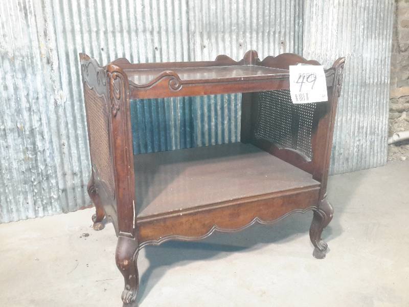 lot 49 image: Weiman, cocktail or display table with wicker sides and drawer
