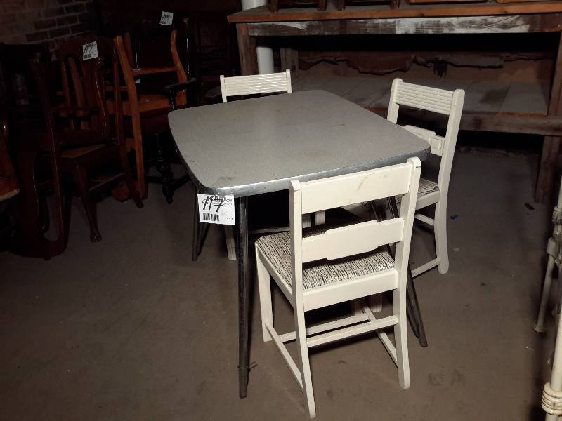 lot 117 image: Mid Century kitchen table with 3 matching wood and upholstered chairs