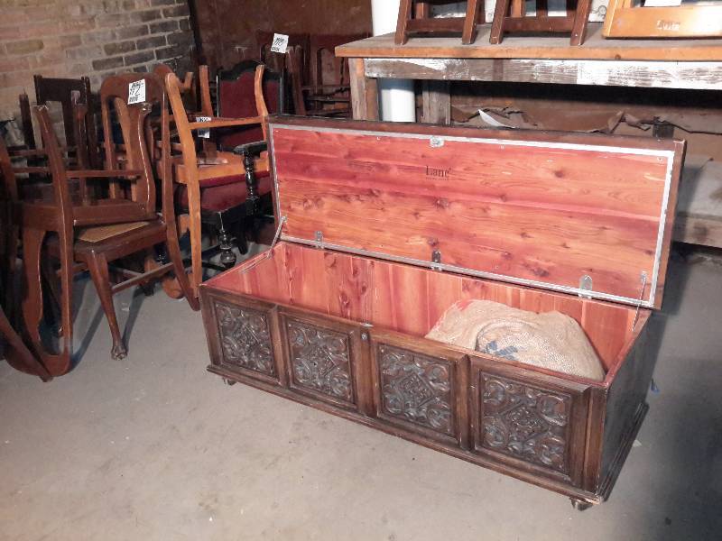 Lane cedar Chest as pictured. Nice carvings.. Padded top and casters ...