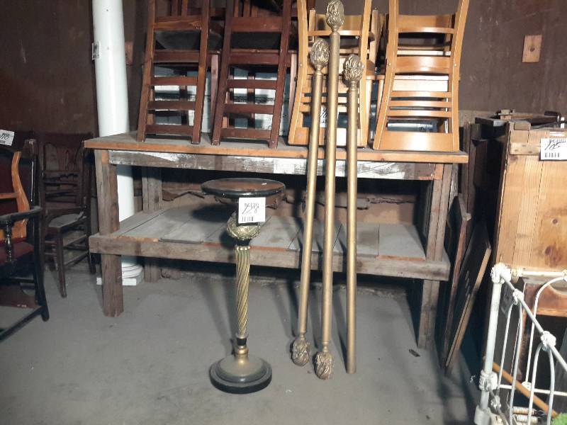 lot 128 image: Nice Brass, glass and hard black plastic plantlamp stand  3 brass curtain rods.. Rods 69 in with fancy finials.