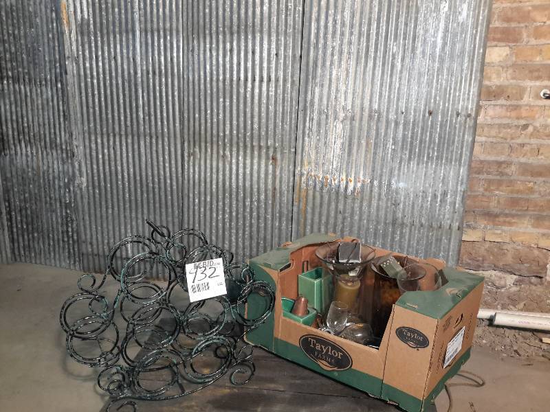 lot 132 image: Misc. Candle holderscandles  Wine rack other items as pictured