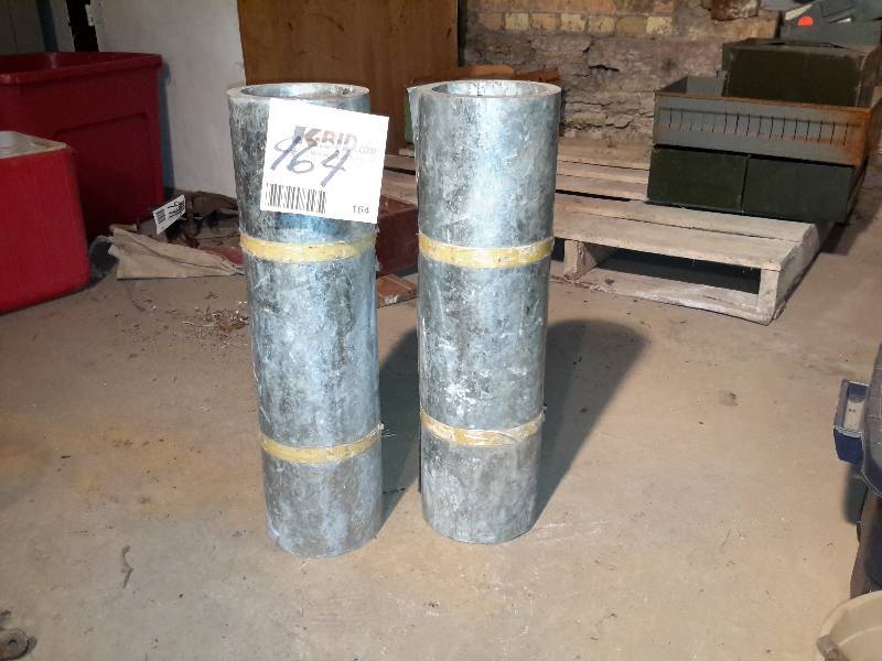 lot 164 image: 2 rolls of galvanized metal.. Approx. 24in x   Probably about 6 ft. per roll