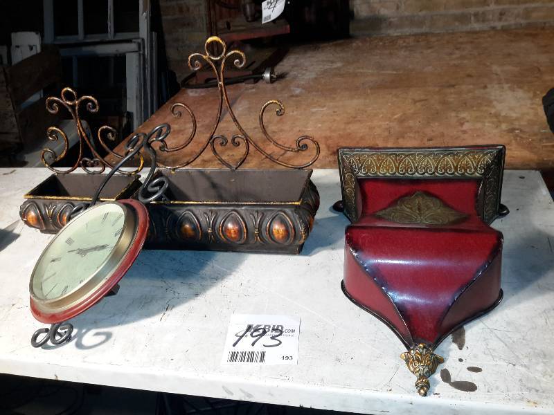 lot 193 image: Wall Sconces and Planters.. Electric (battery) wall clock