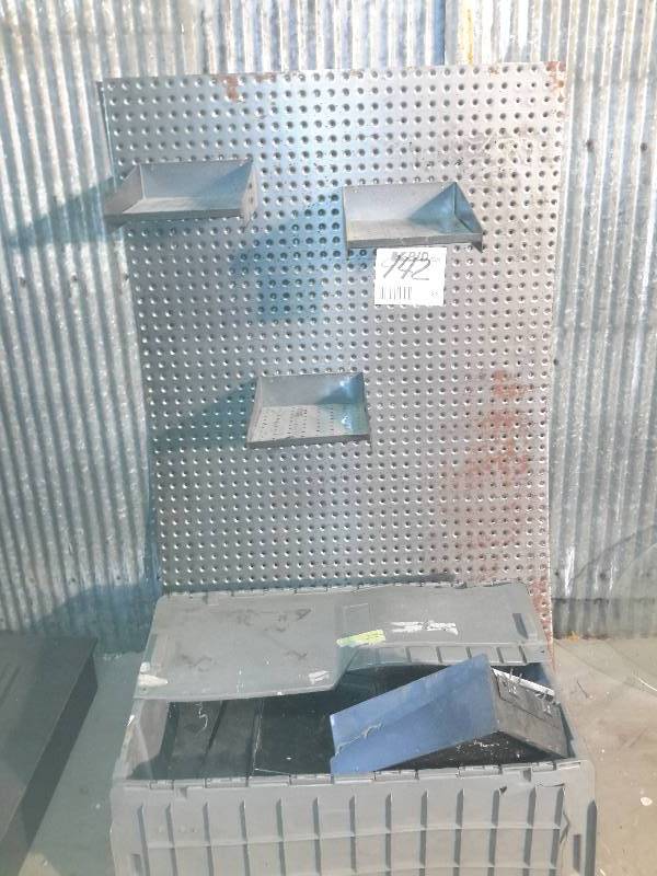 lot 142 image: 10 retail or storage shelves that hook into pegboard