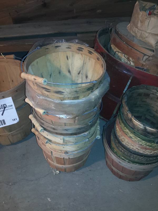 lot 181 image: Large lot of woven baskets.. Some bushel, 12 Bushel, peck, small berry boxes.. 2 metal egg washing baskets