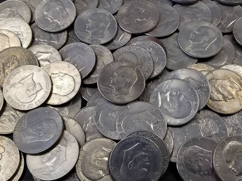 LARGE GROUP OF 96 MIXED CLAD EISENHOWER DOLLARS