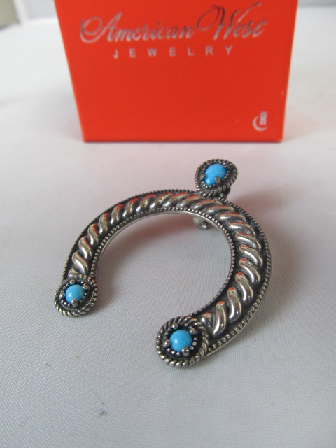 lot 54 image: Sterling Silver & Turquoise Sleeping Beauty Squash Blossom Pendant