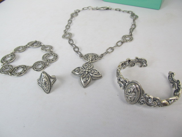 lot 35 image: Ornate Sterling Silver Pendant Necklace Ring & 2 Bracelets