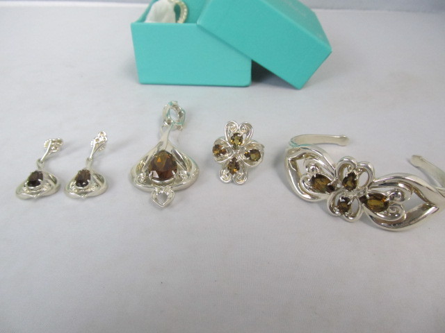 lot 44 image: Sterling Silver & Cut Gemstone Pendant Bracelet Ring & Earrings
