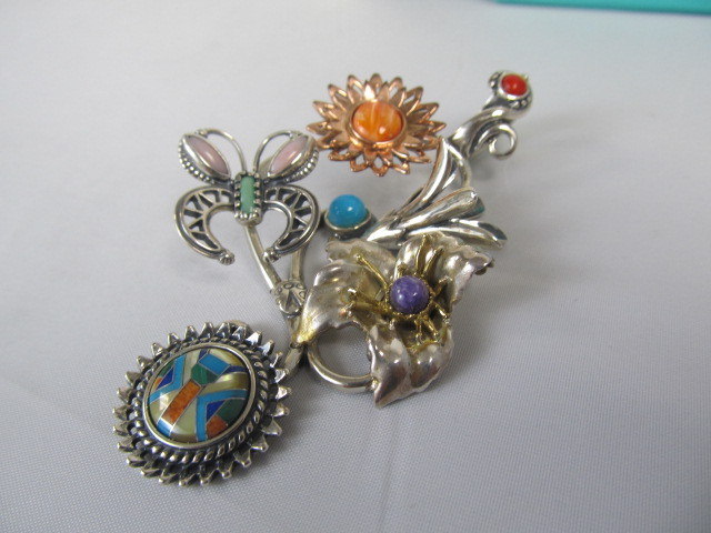 lot 85 image: Large Roderick Tenorio Sterling Silver Multi Gemstone Inlaid Pendant