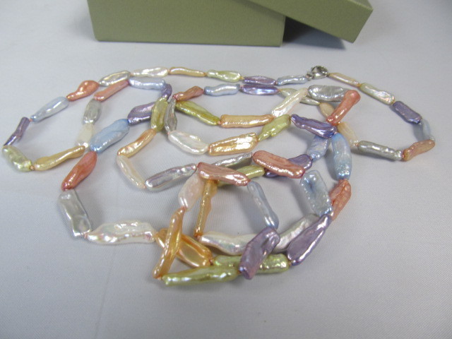 lot 106 image: Strand of Multi Colored Honora Genuine Long Baroque Pearls
